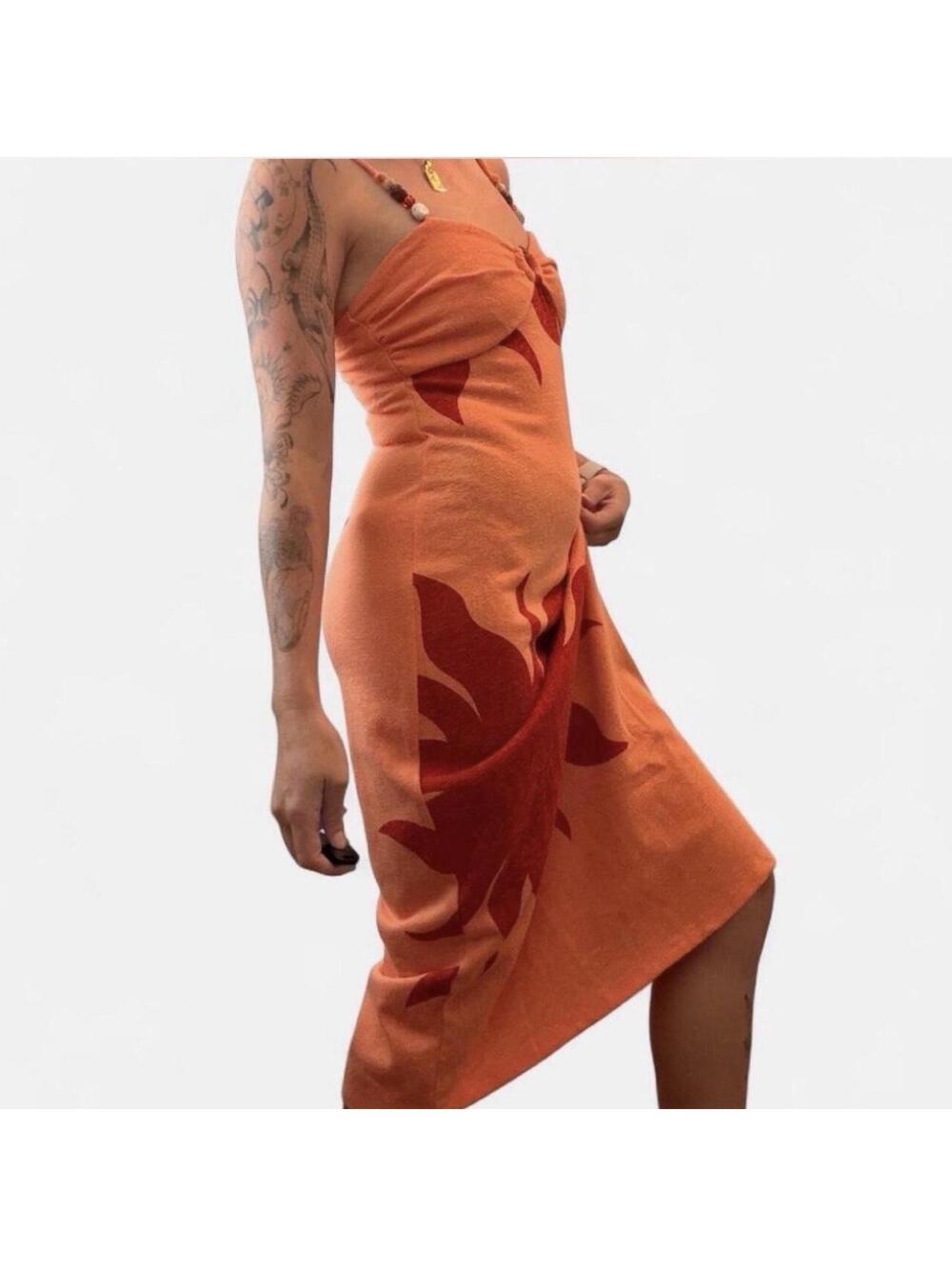 Old navy warm colored sun patterned dress with beads on the straps!